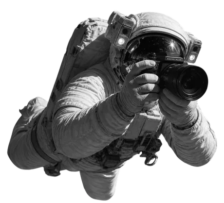Astronaut photographer floating in space